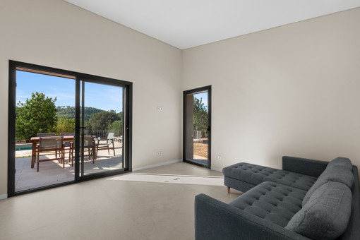 Living area in the separate apartment with access to the private terrace