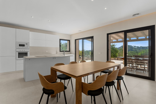 Dining area with open-plan kitchen