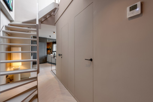 Hallway with wallpaper doors