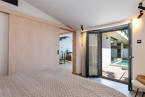 Bright bedroom with access to the outside