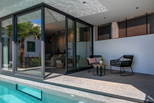 Open-plan living area with seamless transition to the pool area