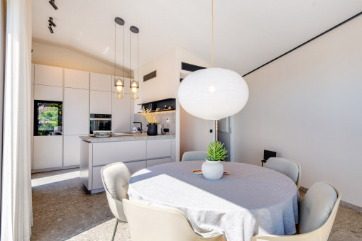 Dining area with panoramic windows and views