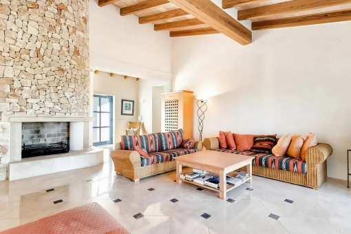 The living room combines rustic and modern style