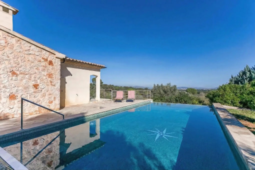 Swimming pool with views across Muro all the way to Alcudia