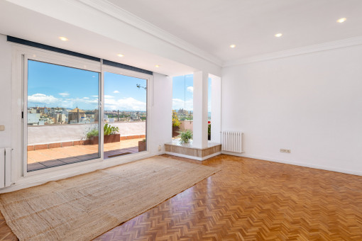 Living area with abundant light and city views