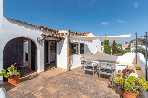Terrace on the upper floor with entrances to separate living units