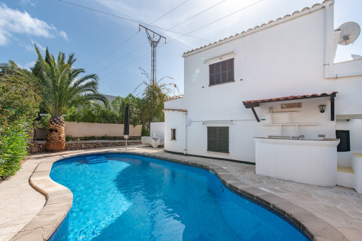 Pool area with outdoor bar