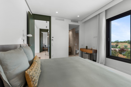 Guest suite with refined en-suite bathroom crafted with premium finishes