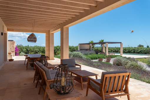 Elegant terrace overlooking the Mediterranean garden and pool