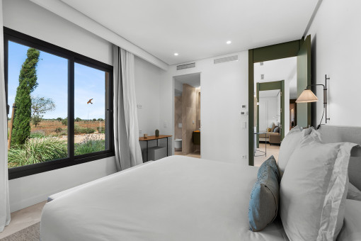 Guest bedroom with built-in wardrobe and en-suite bathroom