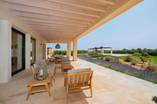 Elegant terrace overlooking the Mediterranean garden and pool