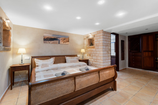 Master bedroom on the ground floor with direct level access to the terrace and pool