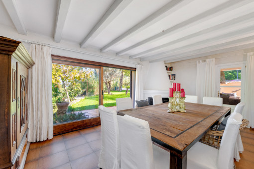 Bright dining area connected to the garden