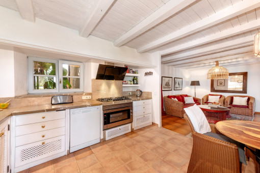 Fully equipped kitchen with separate pantry and cosy breakfast area