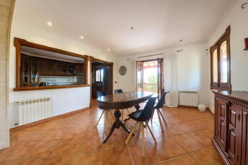 Dining area with open kitchen view