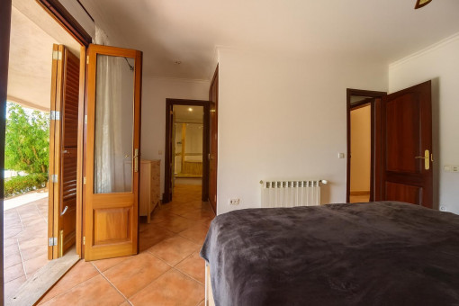 Bedroom with access to terrace and garden