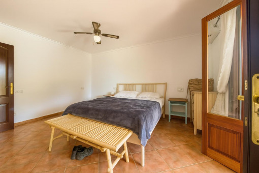 Simple bedroom with balcony access