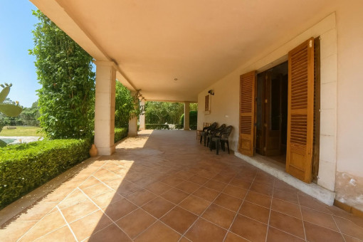 Spacious shaded terrace with garden and pool