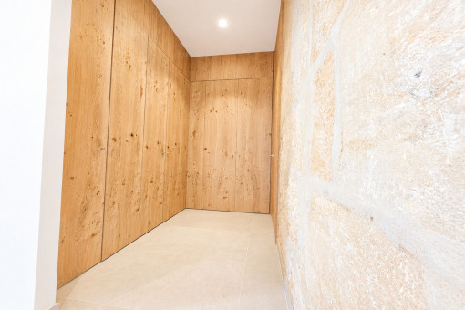 Custom-built wardrobe in the entrance area