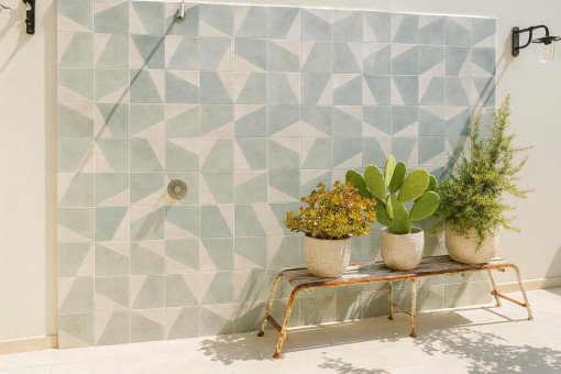 Natural stone wall with showers
