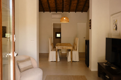 Open living-dining area with pellet stove heating