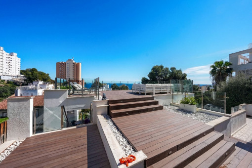 Spacious rooftop terrace with sea views
