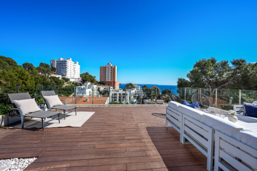 Spacious rooftop terrace with sea views