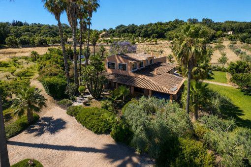 Aerial view of large villa with garden