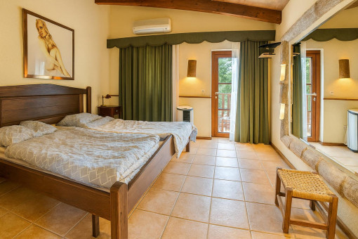 Guest double bedroom with balcony access