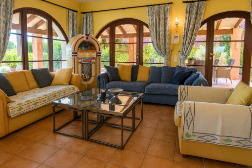 Cozy living area with jukebox and outdoor view