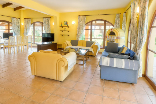 Spacious living dining room with TV