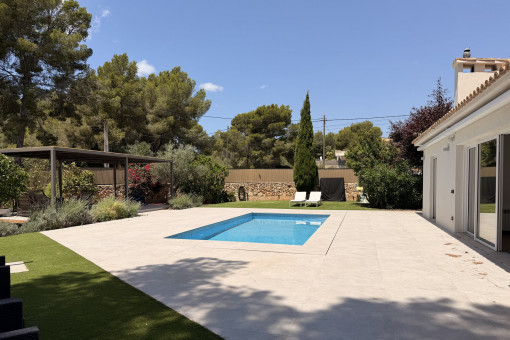 Well-maintained terrace area with pool
