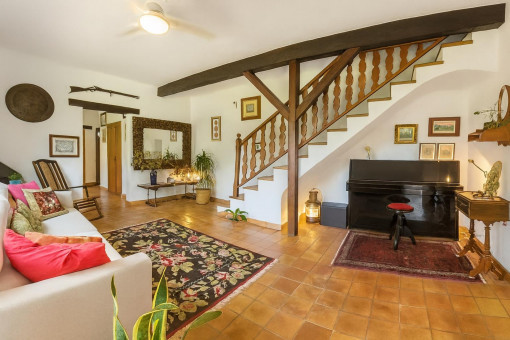 Spacious living room with staircase