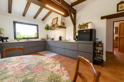 Modern kitchen with wooden beams