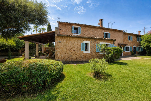 Traditional finca with stone facade and covered terrace