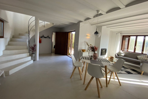 Light flooded living and dining area