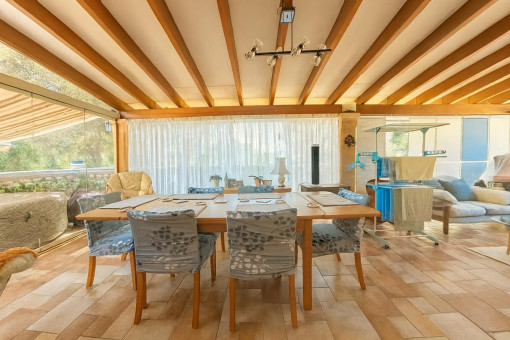 Bright conservatory with expansive windows