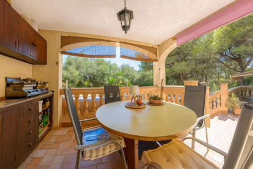 Covered terrace with barbecue area