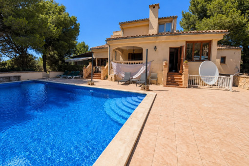 View from the pool area towards the country house and sun terraces