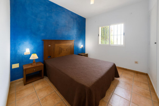 Bedroom with blue feature wall