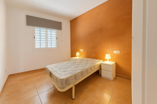 Simple bedroom with lights and window