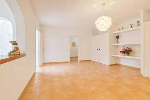 Empty room with built-in shelves