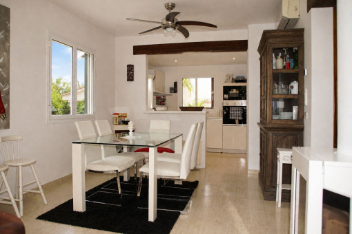 Dining area with adjoining kitchen