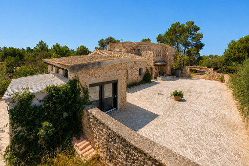 Main house and guest house with stone courtyard
