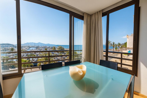 Dining area with sea and marina view