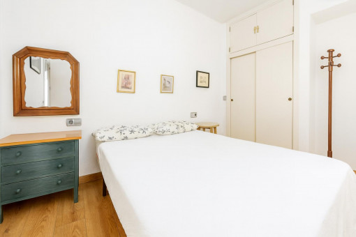 Simple double bedroom with wardrobe