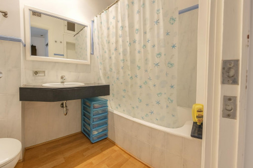Small bathroom with toilet and sink