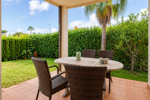 Covered terrace with private garden access