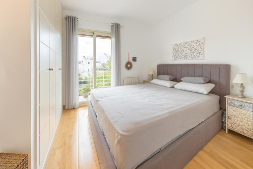 Modern bedroom with balcony door