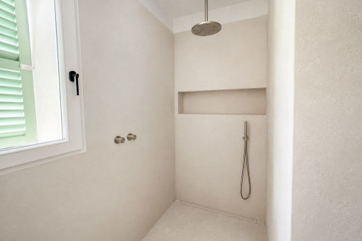 Modern shower with natural stone elements